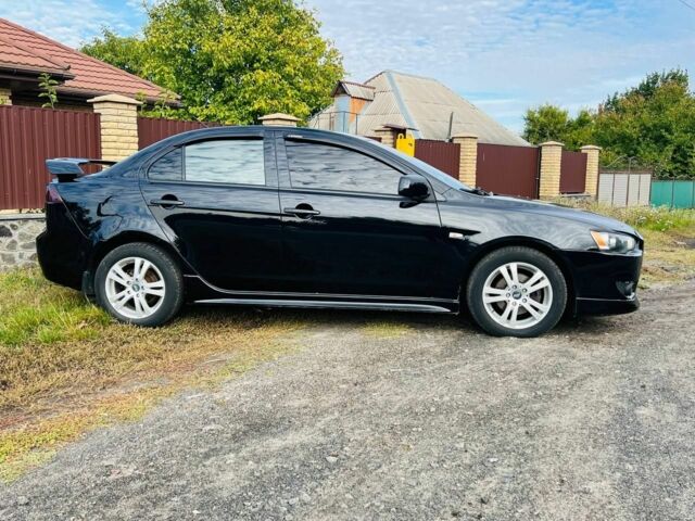 Чорний Міцубісі Lancer, об'ємом двигуна 2 л та пробігом 284 тис. км за 6200 $, фото 2 на Automoto.ua