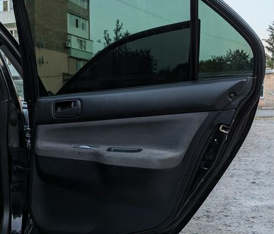 Черный Мицубиси Лансер, объемом двигателя 1.6 л и пробегом 226 тыс. км за 4800 $, фото 11 на Automoto.ua