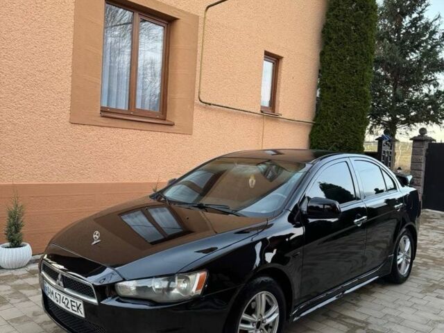 Черный Мицубиси Лансер, объемом двигателя 2 л и пробегом 247 тыс. км за 4700 $, фото 3 на Automoto.ua