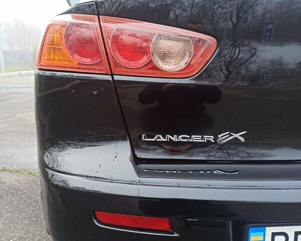 Черный Мицубиси Лансер, объемом двигателя 2 л и пробегом 195 тыс. км за 7899 $, фото 28 на Automoto.ua