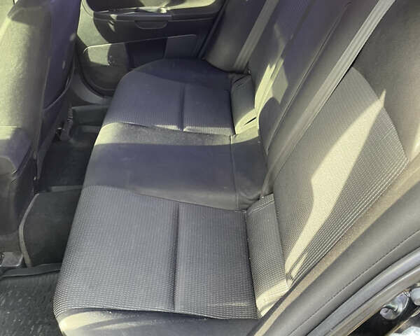 Чорний Міцубісі Lancer, об'ємом двигуна 1.5 л та пробігом 150 тис. км за 6500 $, фото 12 на Automoto.ua