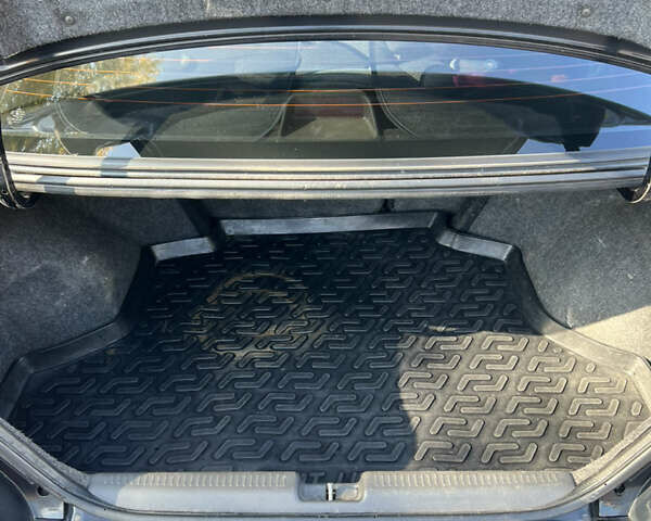 Чорний Міцубісі Lancer, об'ємом двигуна 1.58 л та пробігом 175 тис. км за 5200 $, фото 15 на Automoto.ua