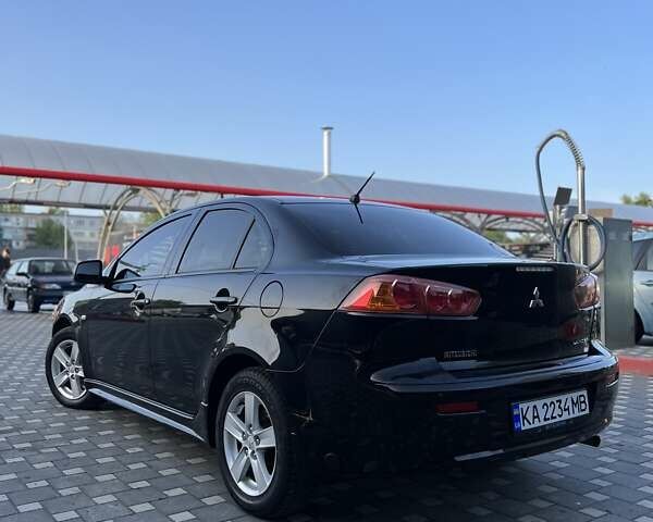 Чорний Міцубісі Lancer, об'ємом двигуна 2 л та пробігом 188 тис. км за 6900 $, фото 10 на Automoto.ua