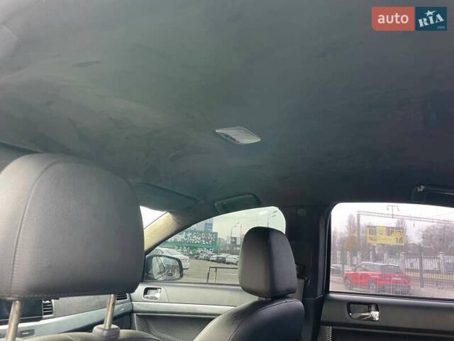 Черный Мицубиси Лансер, объемом двигателя 2 л и пробегом 246 тыс. км за 7500 $, фото 20 на Automoto.ua