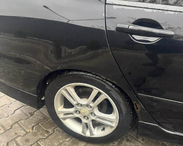Чорний Міцубісі Lancer, об'ємом двигуна 2 л та пробігом 210 тис. км за 5500 $, фото 7 на Automoto.ua
