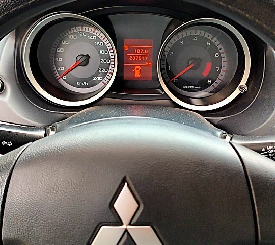 Черный Мицубиси Лансер, объемом двигателя 1.5 л и пробегом 207 тыс. км за 5500 $, фото 9 на Automoto.ua