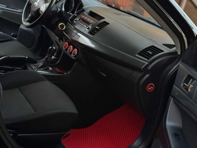 Черный Мицубиси Лансер, объемом двигателя 2 л и пробегом 247 тыс. км за 4700 $, фото 8 на Automoto.ua