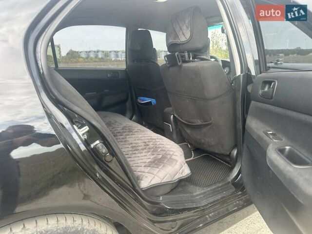 Чорний Міцубісі Lancer, об'ємом двигуна 1.6 л та пробігом 310 тис. км за 5100 $, фото 11 на Automoto.ua