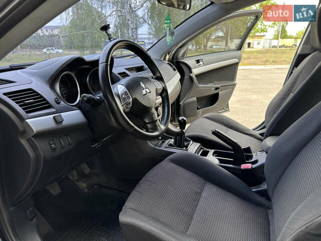 Чорний Міцубісі Lancer, об'ємом двигуна 2 л та пробігом 192 тис. км за 6500 $, фото 12 на Automoto.ua
