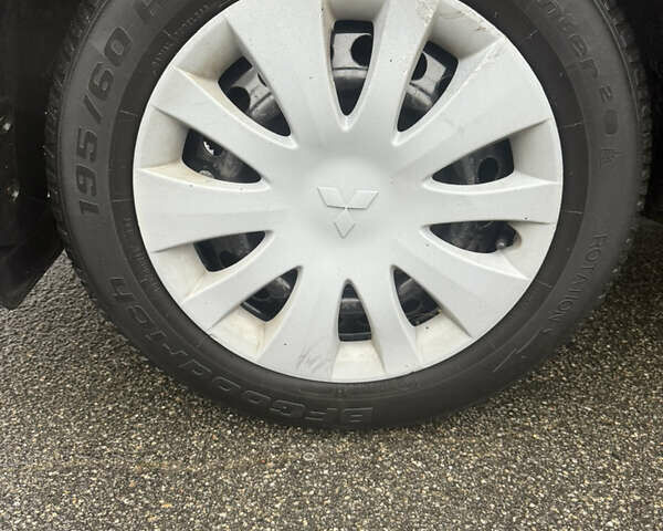 Чорний Міцубісі Lancer, об'ємом двигуна 1.58 л та пробігом 256 тис. км за 3700 $, фото 32 на Automoto.ua