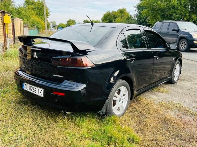 Чорний Міцубісі Lancer, об'ємом двигуна 2 л та пробігом 284 тис. км за 6200 $, фото 3 на Automoto.ua