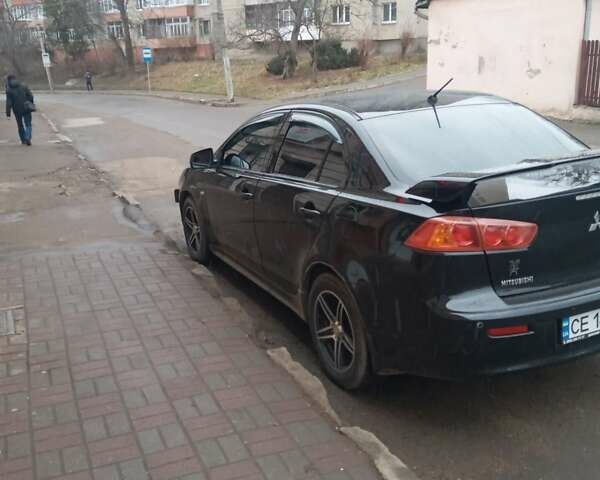 Черный Мицубиси Лансер, объемом двигателя 2 л и пробегом 267 тыс. км за 6000 $, фото 27 на Automoto.ua