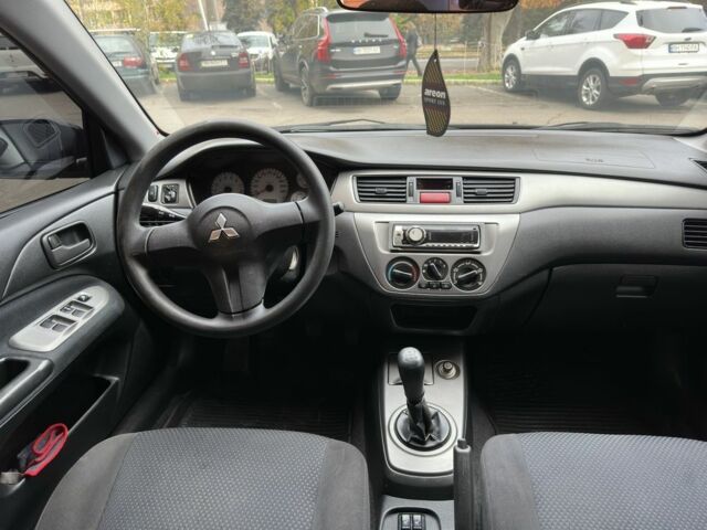 Черный Мицубиси Лансер, объемом двигателя 1.6 л и пробегом 173 тыс. км за 4700 $, фото 13 на Automoto.ua