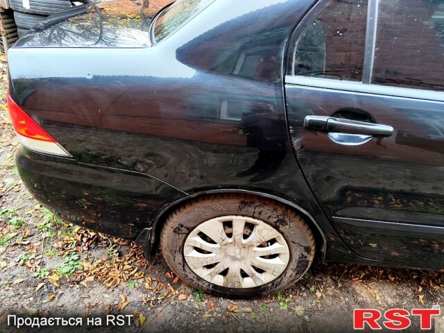 Черный Мицубиси Лансер, объемом двигателя 1.6 л и пробегом 171 тыс. км за 4350 $, фото 5 на Automoto.ua