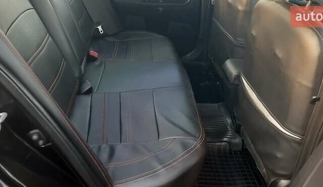 Міцубісі Lancer 2007 у Києві на Automoto.ua Чорний Міцубісі Lancer, об'ємом двигуна 2 л та пробігом 238 тис. км за 5350 $, фото 7 на Automoto.ua