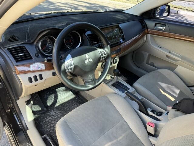 Чорний Міцубісі Lancer, об'ємом двигуна 1.5 л та пробігом 207 тис. км за 6400 $, фото 9 на Automoto.ua