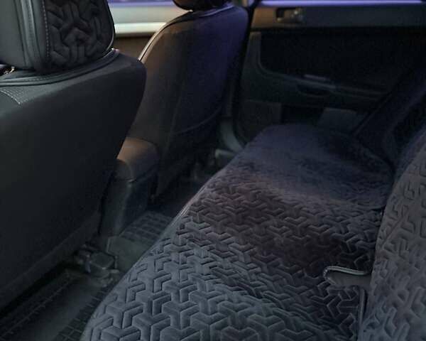 Черный Мицубиси Лансер, объемом двигателя 1.5 л и пробегом 245 тыс. км за 4499 $, фото 9 на Automoto.ua