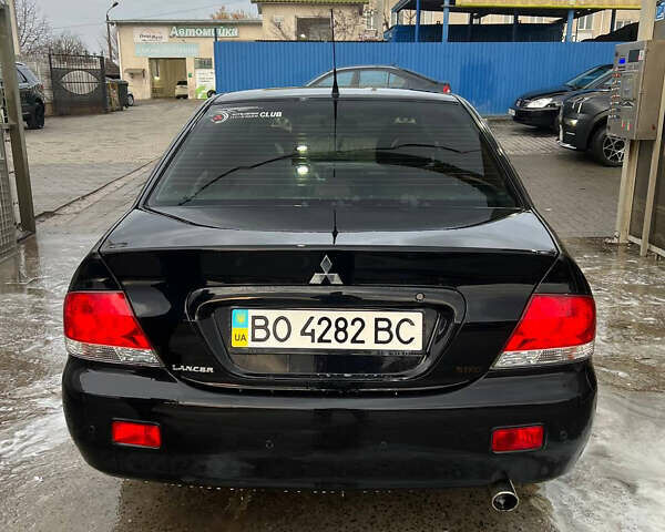 Черный Мицубиси Лансер, объемом двигателя 1.6 л и пробегом 180 тыс. км за 3499 $, фото 10 на Automoto.ua