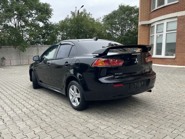 Чорний Міцубісі Lancer, об'ємом двигуна 2 л та пробігом 200 тис. км за 6800 $, фото 2 на Automoto.ua
