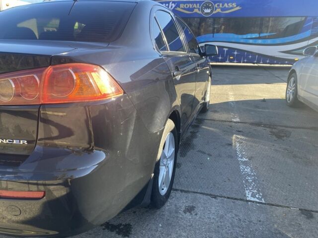 Черный Мицубиси Лансер, объемом двигателя 2 л и пробегом 372 тыс. км за 6200 $, фото 6 на Automoto.ua