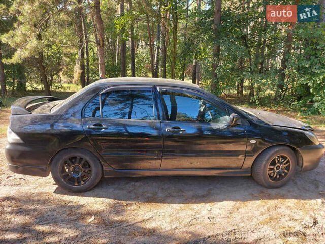 Чорний Міцубісі Lancer, об'ємом двигуна 2 л та пробігом 290 тис. км за 3300 $, фото 5 на Automoto.ua