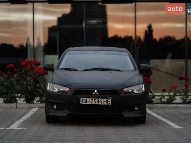 Чорний Міцубісі Lancer, об'ємом двигуна 2 л та пробігом 203 тис. км за 7000 $, фото 15 на Automoto.ua