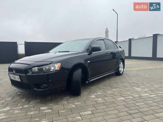 Черный Мицубиси Лансер, объемом двигателя 2 л и пробегом 259 тыс. км за 6500 $, фото 4 на Automoto.ua