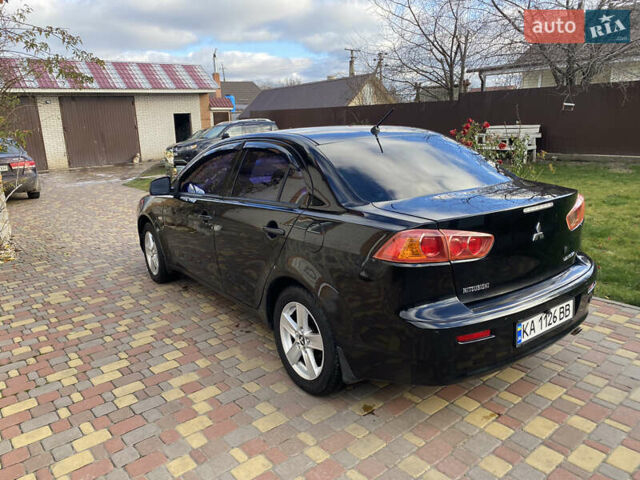 Чорний Міцубісі Lancer, об'ємом двигуна 1.5 л та пробігом 240 тис. км за 5650 $, фото 6 на Automoto.ua