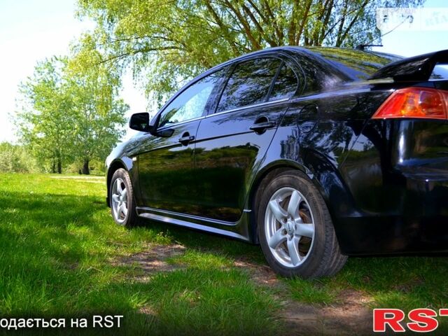 Чорний Міцубісі Lancer, об'ємом двигуна 1.8 л та пробігом 226 тис. км за 6600 $, фото 4 на Automoto.ua