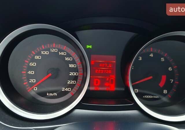 Черный Мицубиси Лансер, объемом двигателя 2 л и пробегом 230 тыс. км за 7100 $, фото 12 на Automoto.ua