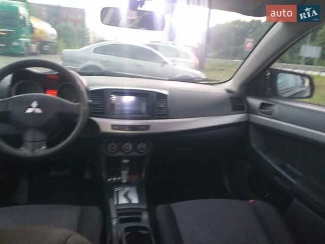 Черный Мицубиси Лансер, объемом двигателя 1.5 л и пробегом 270 тыс. км за 4500 $, фото 16 на Automoto.ua