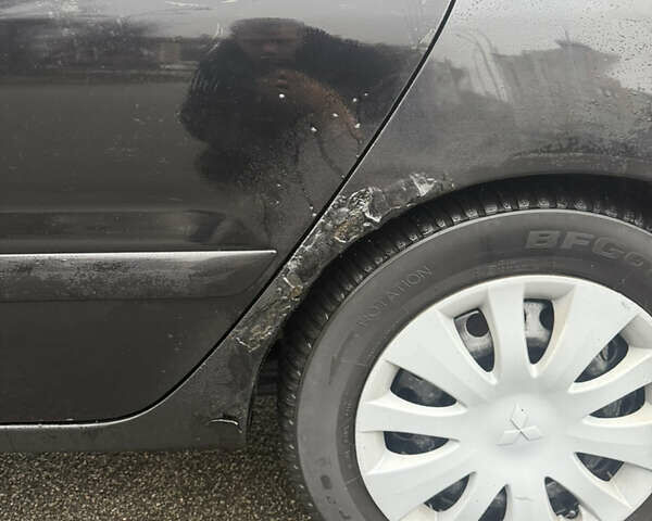 Чорний Міцубісі Lancer, об'ємом двигуна 1.58 л та пробігом 256 тис. км за 3700 $, фото 38 на Automoto.ua