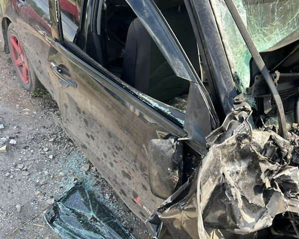 Мицубиси Лансер 2007 в Славянске на Automoto.ua Черный Мицубиси Лансер, объемом двигателя 1.6 л и пробегом 190 тыс. км за 2000 $, фото 2 на Automoto.ua