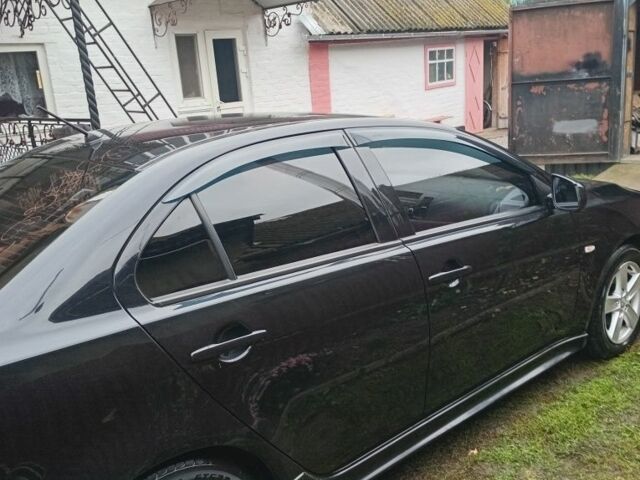 Чорний Міцубісі Lancer, об'ємом двигуна 2 л та пробігом 273 тис. км за 7100 $, фото 5 на Automoto.ua