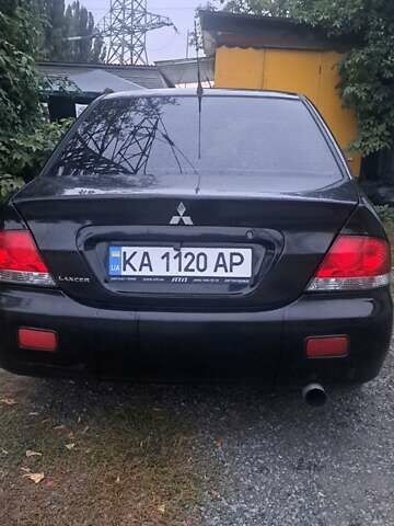 Чорний Міцубісі Lancer, об'ємом двигуна 1.6 л та пробігом 234 тис. км за 3900 $, фото 5 на Automoto.ua