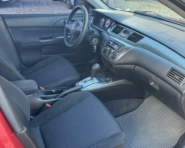 Чорний Міцубісі Lancer, об'ємом двигуна 1.6 л та пробігом 195 тис. км за 5000 $, фото 4 на Automoto.ua