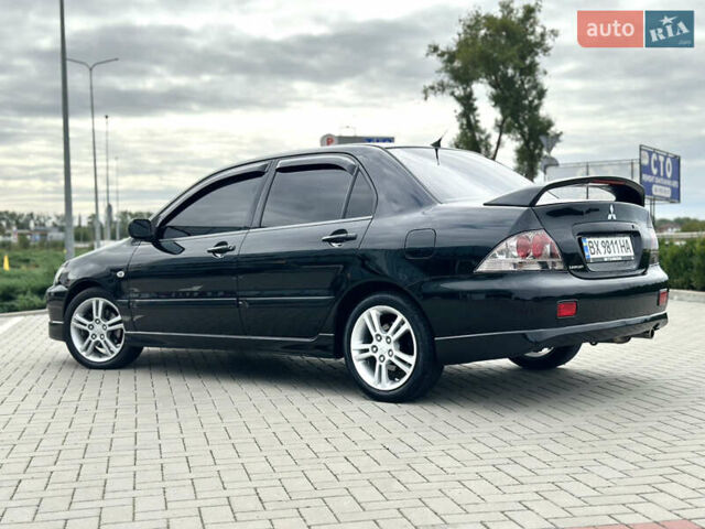 Чорний Міцубісі Lancer, об'ємом двигуна 2 л та пробігом 275 тис. км за 5300 $, фото 14 на Automoto.ua