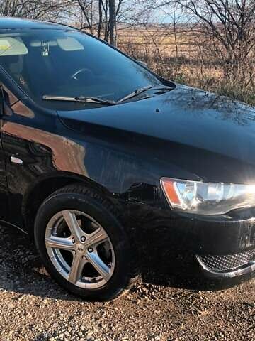 Черный Мицубиси Лансер, объемом двигателя 1.5 л и пробегом 270 тыс. км за 4999 $, фото 8 на Automoto.ua