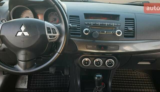 Міцубісі Lancer 2007 у Києві на Automoto.ua Чорний Міцубісі Lancer, об'ємом двигуна 2 л та пробігом 238 тис. км за 5350 $, фото 13 на Automoto.ua