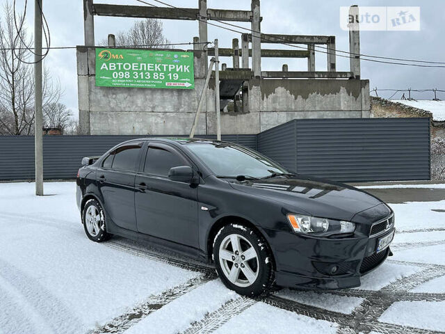 Чорний Міцубісі Lancer, об'ємом двигуна 2 л та пробігом 199 тис. км за 7000 $, фото 3 на Automoto.ua