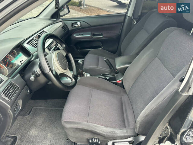 Чорний Міцубісі Lancer, об'ємом двигуна 2 л та пробігом 275 тис. км за 5300 $, фото 37 на Automoto.ua