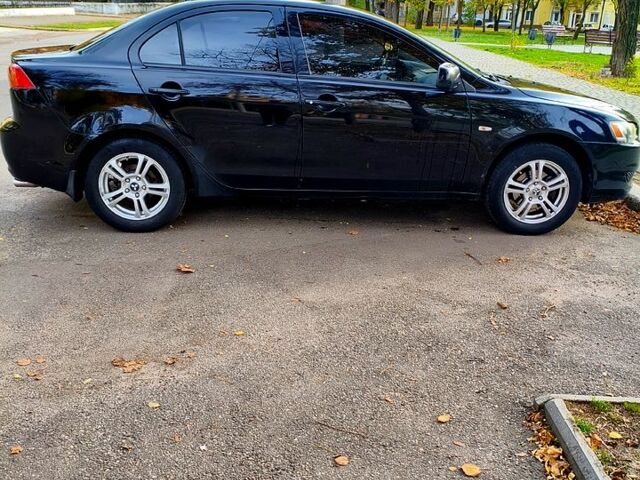 Черный Мицубиси Лансер, объемом двигателя 1.5 л и пробегом 207 тыс. км за 5500 $, фото 2 на Automoto.ua