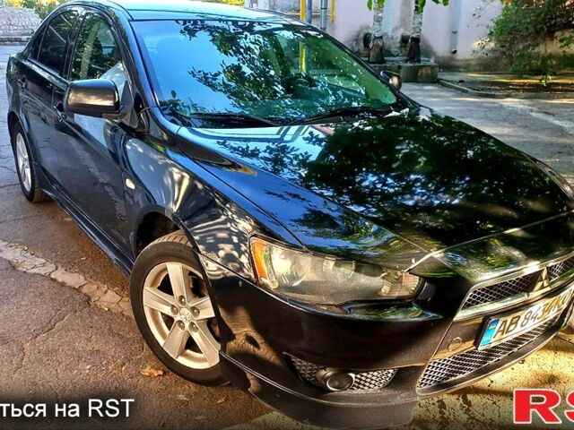 Черный Мицубиси Лансер, объемом двигателя 2 л и пробегом 290 тыс. км за 5800 $, фото 5 на Automoto.ua