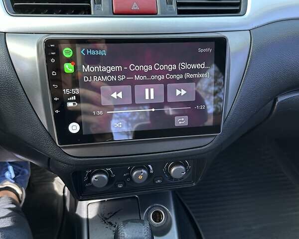 Черный Мицубиси Лансер, объемом двигателя 2 л и пробегом 272 тыс. км за 5514 $, фото 5 на Automoto.ua