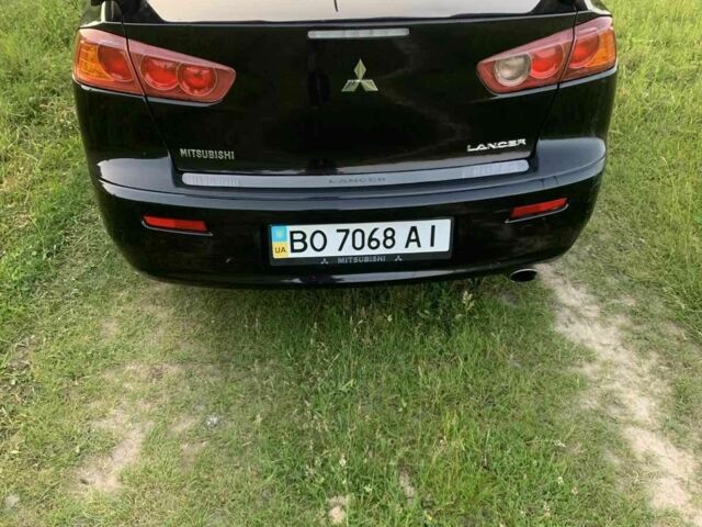 Черный Мицубиси Лансер, объемом двигателя 2 л и пробегом 208 тыс. км за 4300 $, фото 4 на Automoto.ua