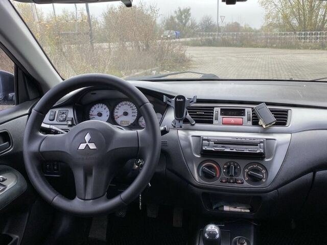 Черный Мицубиси Лансер, объемом двигателя 1.6 л и пробегом 263 тыс. км за 2900 $, фото 9 на Automoto.ua