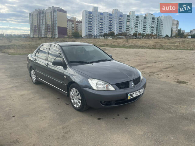 Чорний Міцубісі Lancer, об'ємом двигуна 1.6 л та пробігом 162 тис. км за 4650 $, фото 2 на Automoto.ua