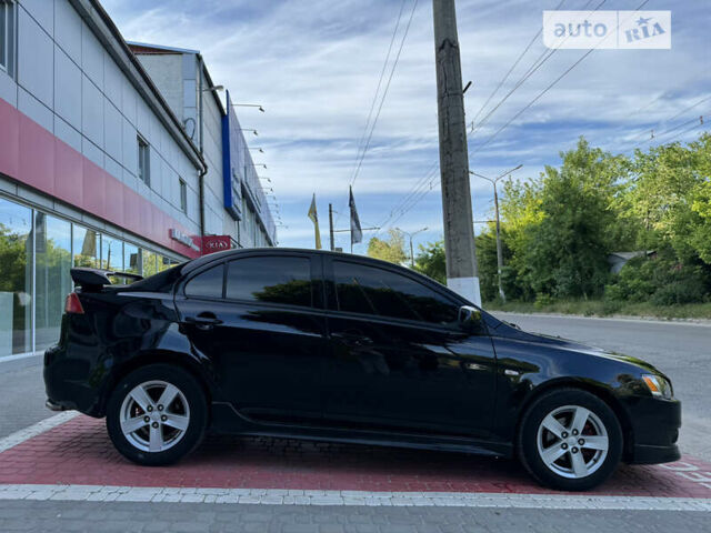 Чорний Міцубісі Lancer, об'ємом двигуна 2 л та пробігом 200 тис. км за 6900 $, фото 4 на Automoto.ua