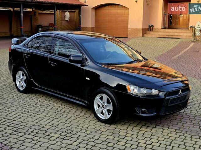 Чорний Міцубісі Lancer, об'ємом двигуна 2 л та пробігом 260 тис. км за 6555 $, фото 8 на Automoto.ua