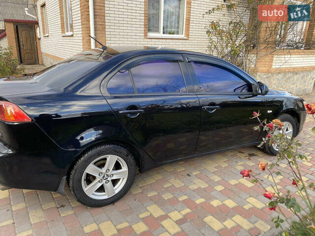 Чорний Міцубісі Lancer, об'ємом двигуна 1.5 л та пробігом 240 тис. км за 5650 $, фото 10 на Automoto.ua